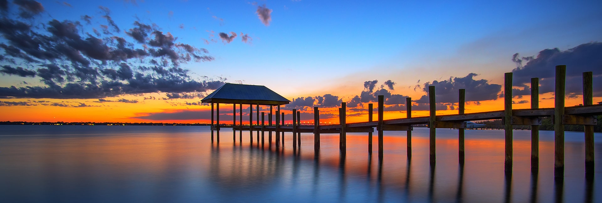 colorful blue and orange sky on waterfront