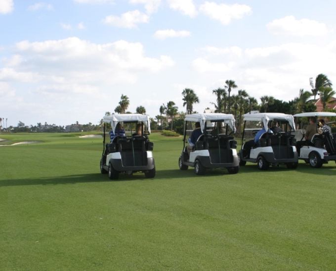 golf carts in a row at Jack Nicklaus Golf Course Reopening event at sailfish