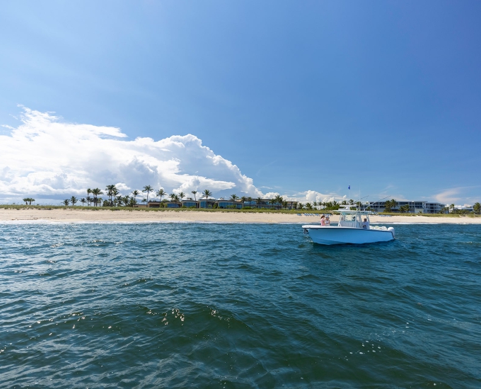 view of the sailfish point oceanfront club from the ocean