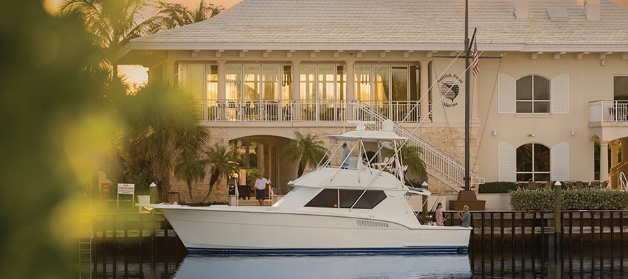 A boat at the Sailfish Point Private Yacht Club and Marina