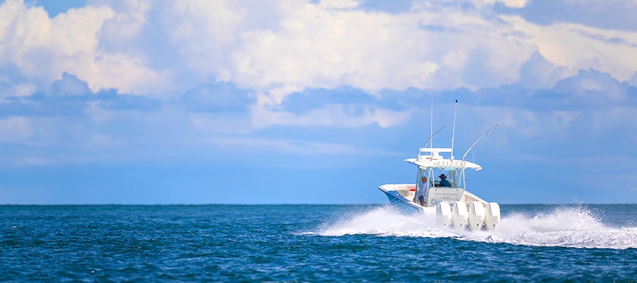 A boat moving towards the horizon