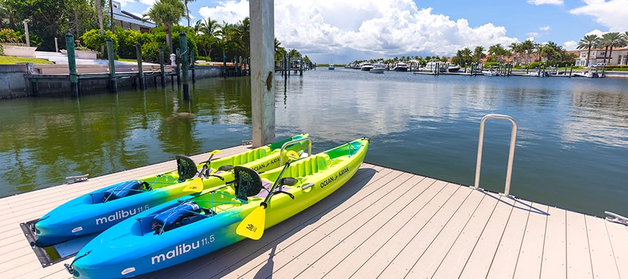 Two kayaks on a dock at Sailfish Point Private Yacht Club