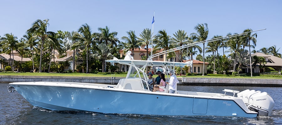 Sailfish Point Private Yacht Club members on boat