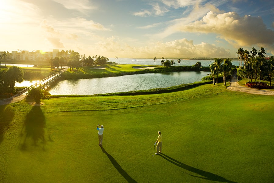 Golfers playing on sailfish points championship golf course