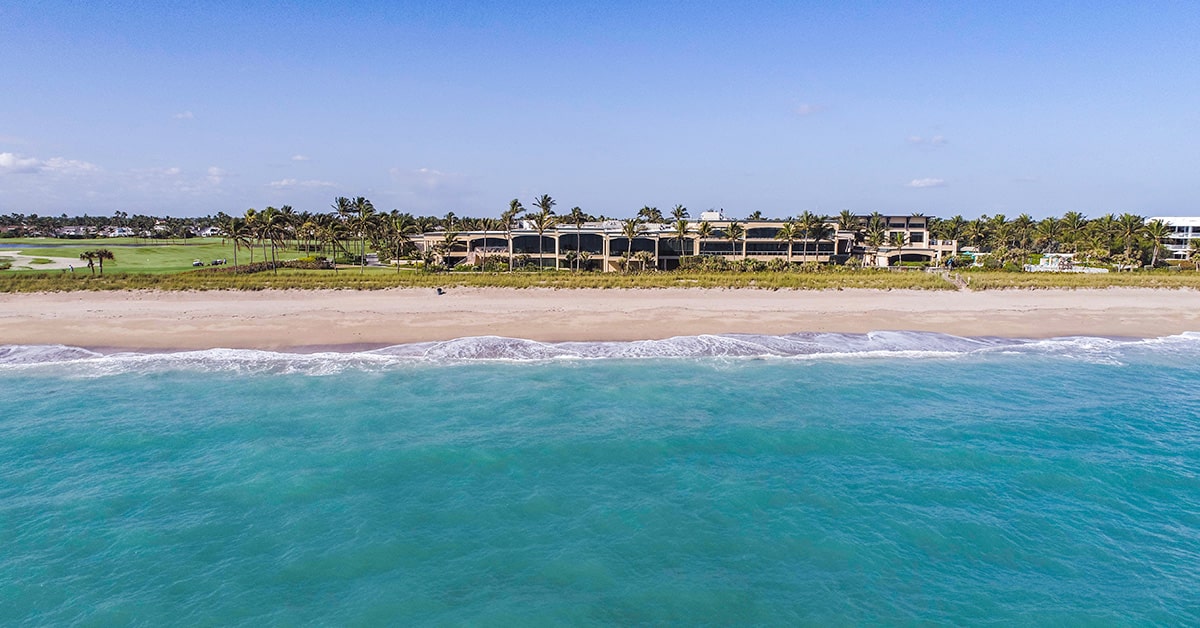 image of beachside exterior of sailfish point oceanfront clubhouse