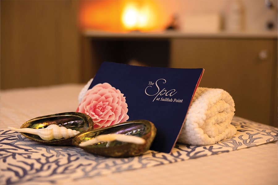 Sailfish Point Spa setting with the candle, shells and towel