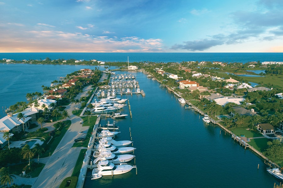 sailfish point inlet with yachts docked 
