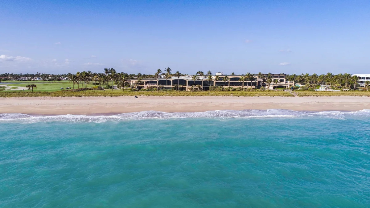 Evening glow on the Oceanfront Clubhouse and pool terrace overlooking the Atlantic