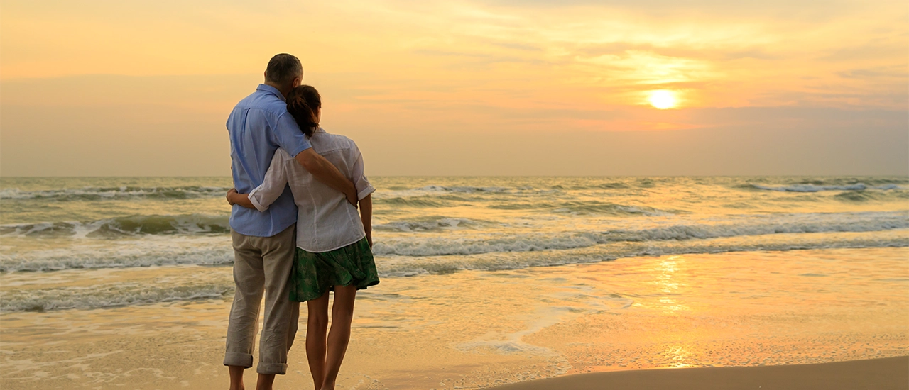 Quiet sunrise along Sailfish Point’s beach with soft light and shoreline