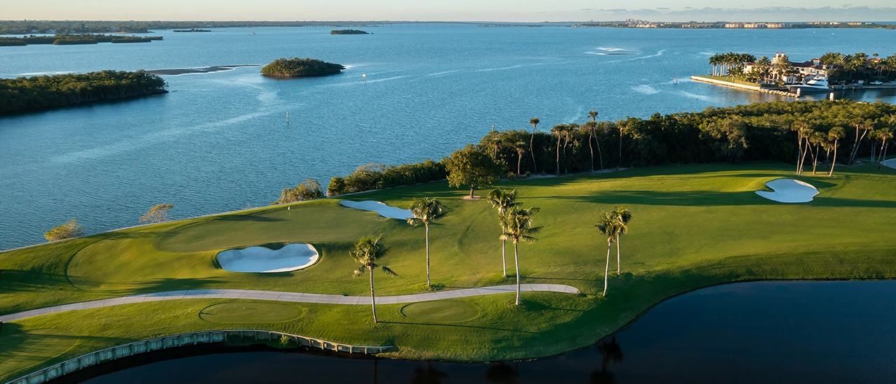 Coastal golf fairway at Sailfish Point with sweeping water views and morning light